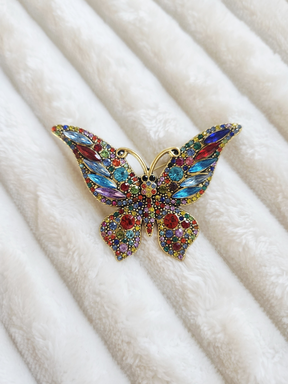 Multicolor Crystal Butterfly Brooch in Gold-Tone